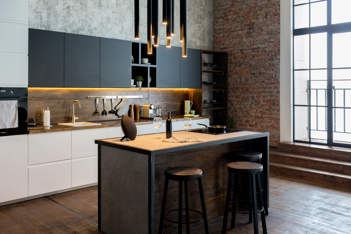 open concept kitchen using a black industrial style with wooden accents